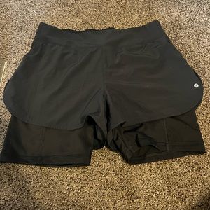 Athletic shorts with built in under short